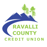 Logo with blue mountains, a curved blue line, and green pine trees above the words "Ravalli County Credit Union" in green, all on a white background.